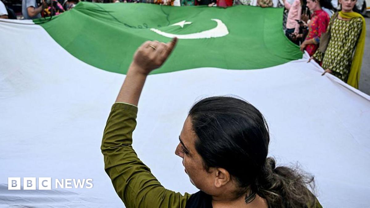 Members of the transgender community hold a Pakistani flag in an anti-India protest in Karachi on 8 May 2025.