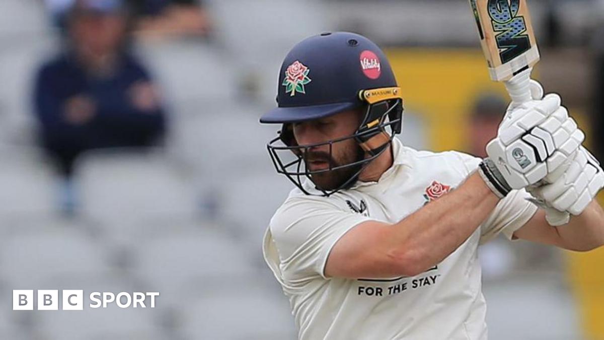 Right-hander Josh Bohannon, wearing his Lancashire helmet, cuts a shot