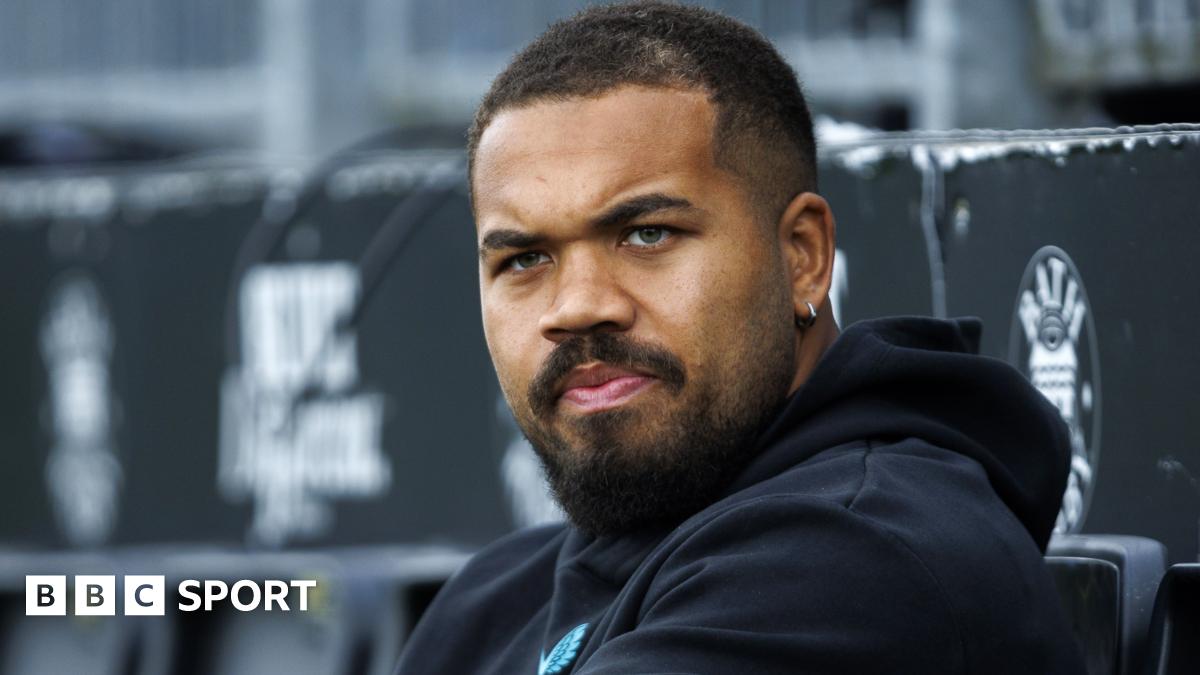 Ollie Lawrence is taken off the pitch on a medical cart