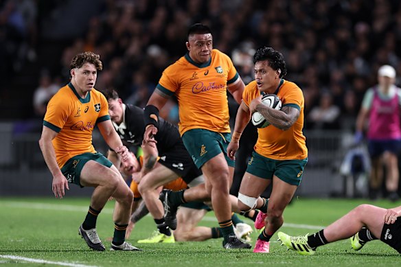 Len Ikitau of Australia charges forward 