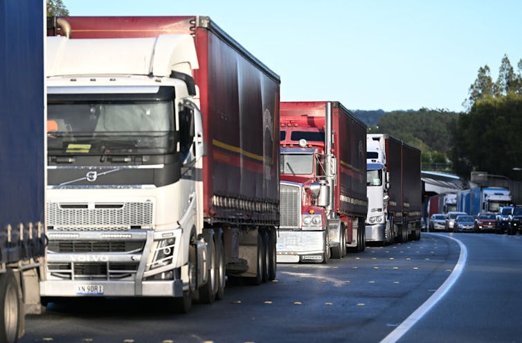 A line of heavy vehicles