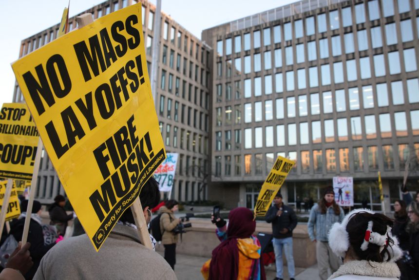 Demonstrators gather outside of the Office of Personnel Management in Washington, D.C. on February 7, 2025 to protest federal layoffs and demand the termination of Elon Musk from the Department of Government Efficiency (DOGE).