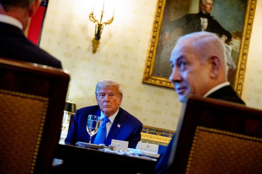 Israeli Prime Minister Benjamin Netanyahu  and US President Donald Trump attend a dinner in the Blue Room of the White House on July 7.