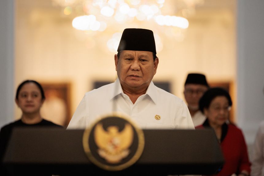 Indonesia's President Prabowo Subianto walks to speak about a recent wave of nationwide protests during a press conference alongside political party leaders at the Presidential Palace in Jakarta on Sunday.