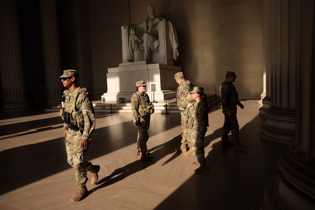 Members of the National Guard patrol inside the Lincoln Memorial on the National Mall in Washington, DC, on August 29. Some international travelers have expressed concern about their presence.