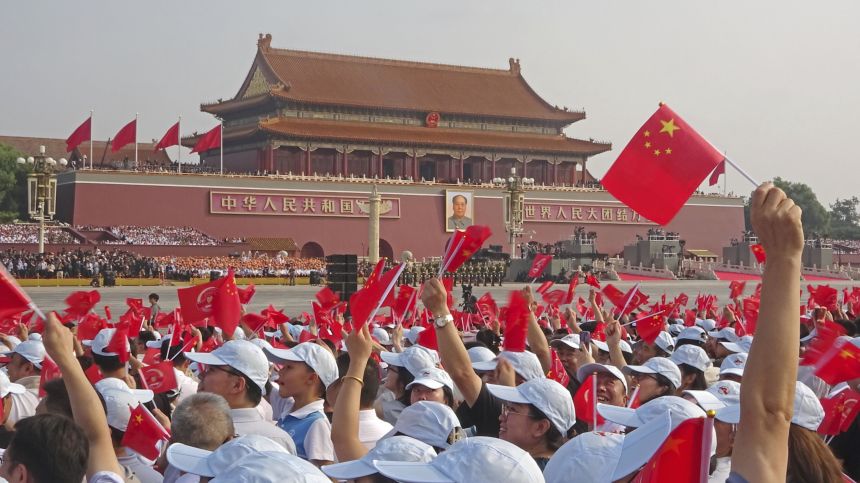 People gather at Tiananmen Square in Beijing on Sept. 3, 2025, for a military parade marking the 80th anniversary of Japan's defeat in World War II.
