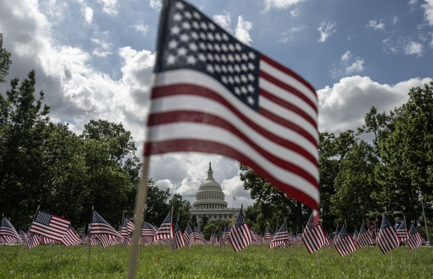 A single flag is planted in memory of Charlie Kirk alongside a field of flags marking the 24th anniversary of the 9/11 terrorist attacks, outside the US Capitol in Washington, DC on September 11.