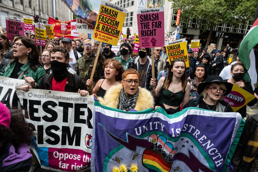 The counter protest by Stand Up to Racism and other anti fascist groups makes its way down Kingsway towards Trafalgar Square in London today.