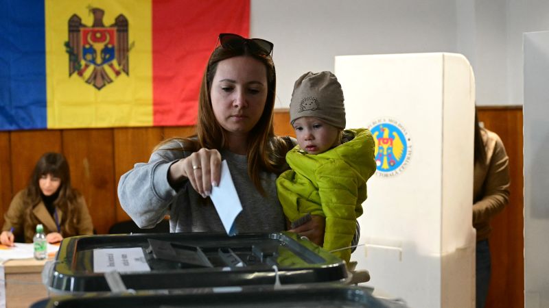Moldovans cast ballots in a tense election plagued by Russian interference claims