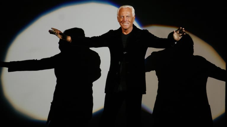 Giorgio Armani receives his share of applause after presenting his Emporio Fall-Winter 2007-2008 men's fashion collection, during the Milan Men's Fashion Week, in Milan, Italy.
