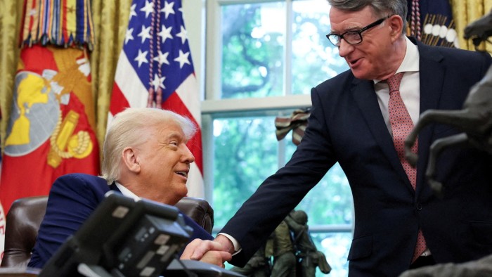 Donald Trump shakes hands with Peter Mandelson in the Oval Office, both smiling after announcing a trade deal.