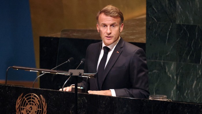 French President Emmanuel Macron speaks at the podium during a session at UN headquarters in New York.