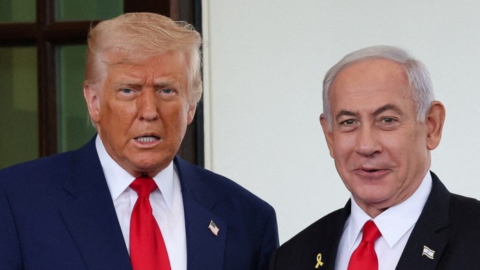 Donald Trump and Benjamin Netanyahu stand side by side, both wearing dark suits and red ties