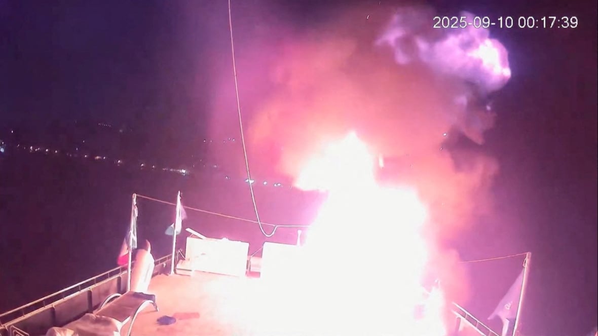 CCTV footage shows a fire on the deck of a docked boat