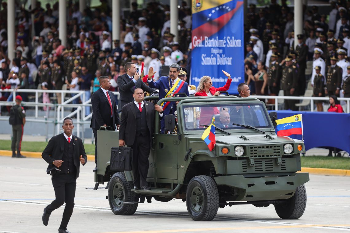 July 5: President of Venezuela Nicolas Maduro (center, standing in vehicle) arrives with First Lady Cilia Flores before the military parade as part of 214th anniversary of Venezuela’s independence celebrations in Caracas, Venezuela.