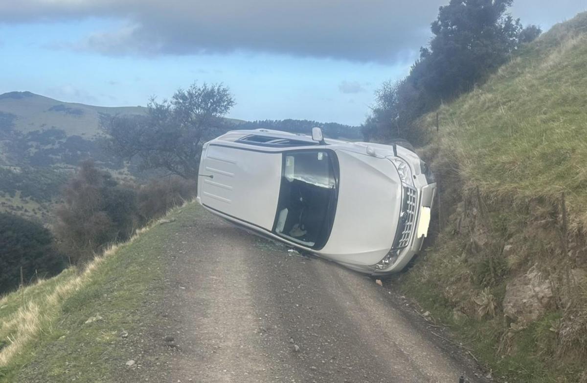 'Very lucky': Couple narrowly avoid 100m drop after car rolls