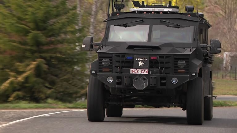 Police vehicles in Porepunkah as the hunt for accused police killer Dezi Freeman continued. 