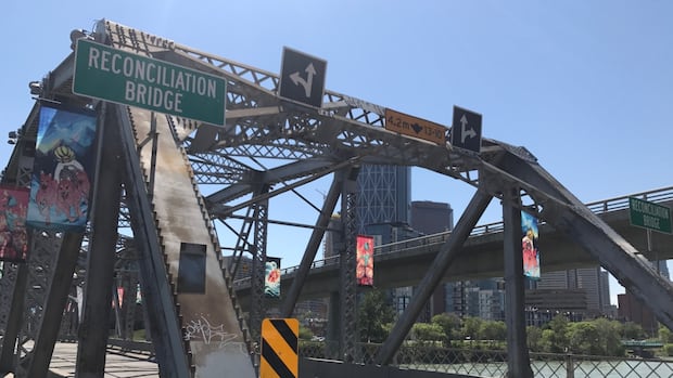 Elderly cyclist dies after hitting barrier on Calgary pathway that had been 'altered'