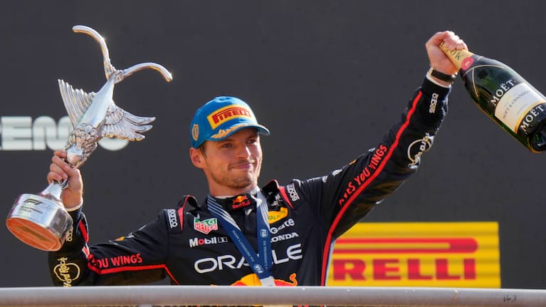 Red Bull driver Max Verstappen of the Netherlands celebrates on the podium after winning the Italian Grand Prix race at the Monza racetrack in Monza, Italy, Sunday, Sept. 7, 2025