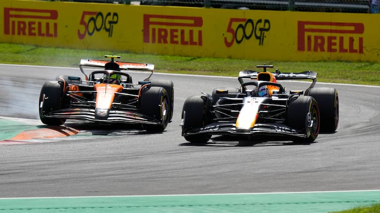 Red Bull driver Max Verstappen of the Netherlands, left, overtakes McLaren driver Lando Norris of Britain during the Italian Grand Prix race at the Monza racetrack in Monza, Italy, Sunday, Sept. 7, 2025