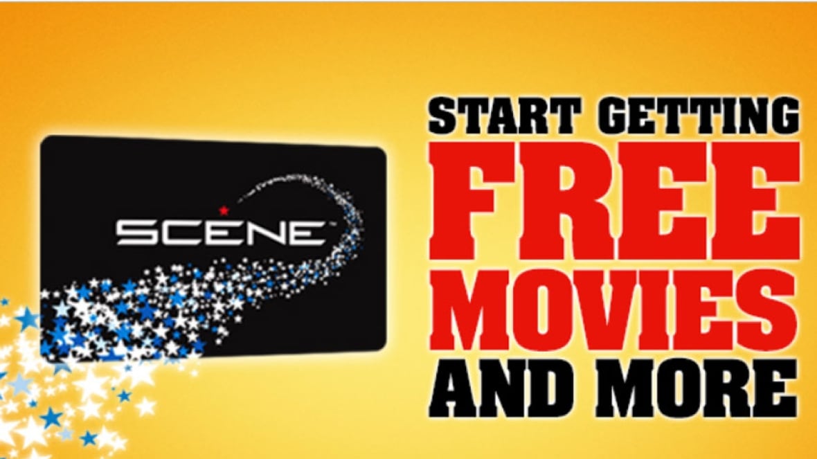 A black card with the word scene on it is seen aganist a bright yellow background