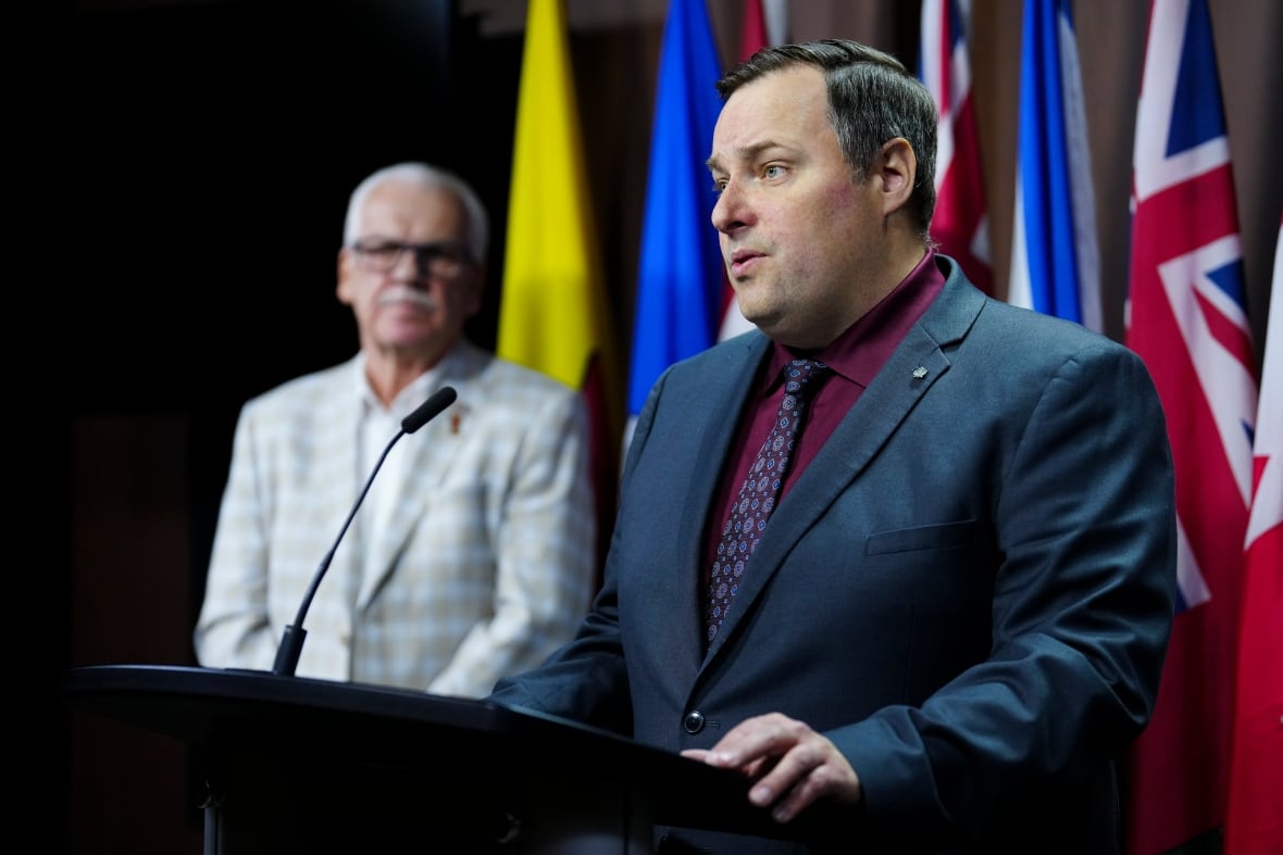A union leader speaks at a news conference.