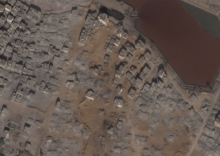 Armored vehicles and tanks are amassed just east of the Sheikh Radwan Pond, in this satellite image taken on September 16, 2025. Surrounding buildings have been heavily damaged by tank fire and systematic demolitions in recent days.