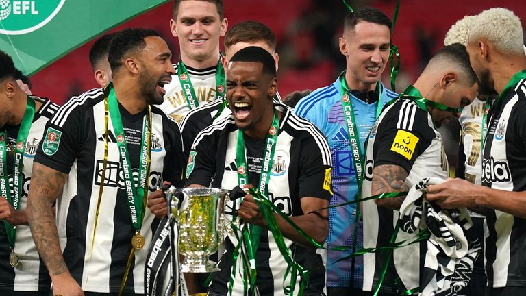 Alexander Isak lifts the Carabao Cup trophy after Newcastle's win over Liverpool in March. File pic: PA