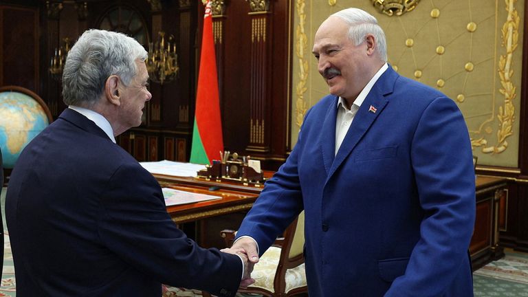 Belarusian President Alexander Lukashenko greets John Coale, a representative of President Trump. Pic: Reuters