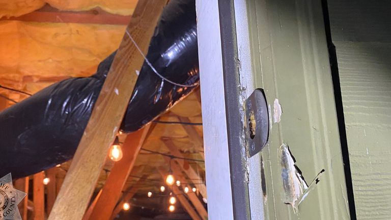 The door to the crawl space was damaged and locked. Pic: Clackamas County Sheriff's Office