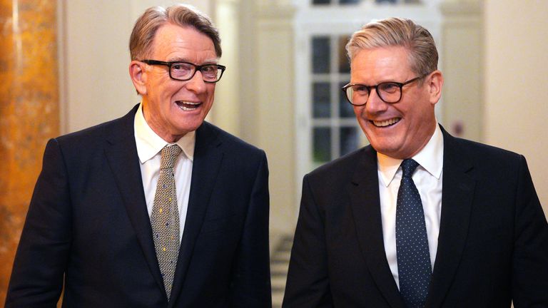 Prime Minister Sir Keir Starmer (R) and British ambassador to the United States Peter Mandelson during a welcome reception at the ambassador's residence in Washington, DC. 