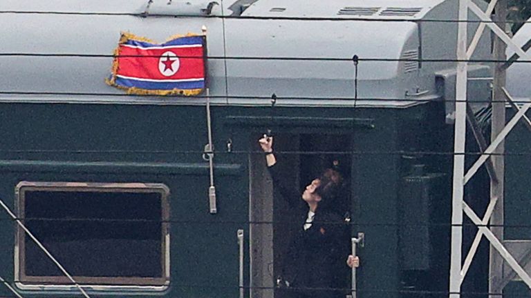 A North Korean flag flutters from the train believed to be carrying Kim Jong Un. Pic: Reuters