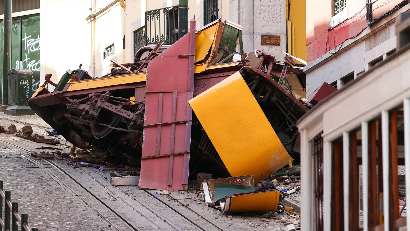 The remains of the crashed funicular carriage in Lisbon. Pic: Reuters