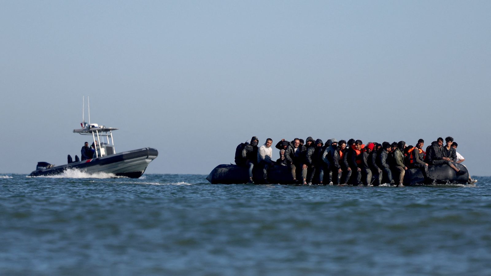 Migrants attempt to cross the English Channel from northern France in August 2025. Pic: Reuters