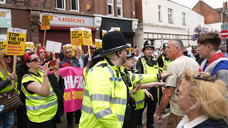 Scuffles between anti-migration protesters and counter-demonstrators on 9 August. Pic: PA