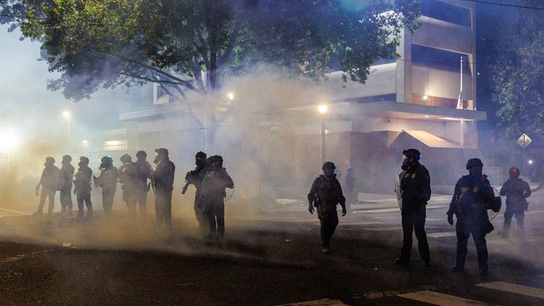 People protest against President Trump's immigration policies in Portland in June. Pic: Reuters