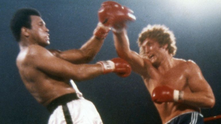 Joe Bugner launches an attack on Muhammed Ali during their heavyweight fight in 1973