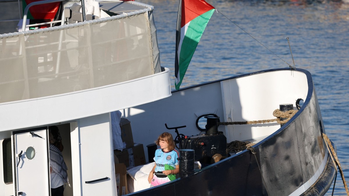 Swedish pro-Palestinian and climate activist Greta Thunberg aboard a vessel of the flotilla carrying activists and humanitarian aid to the Gaza Strip, moored at Barcelona port on September 1, 2025