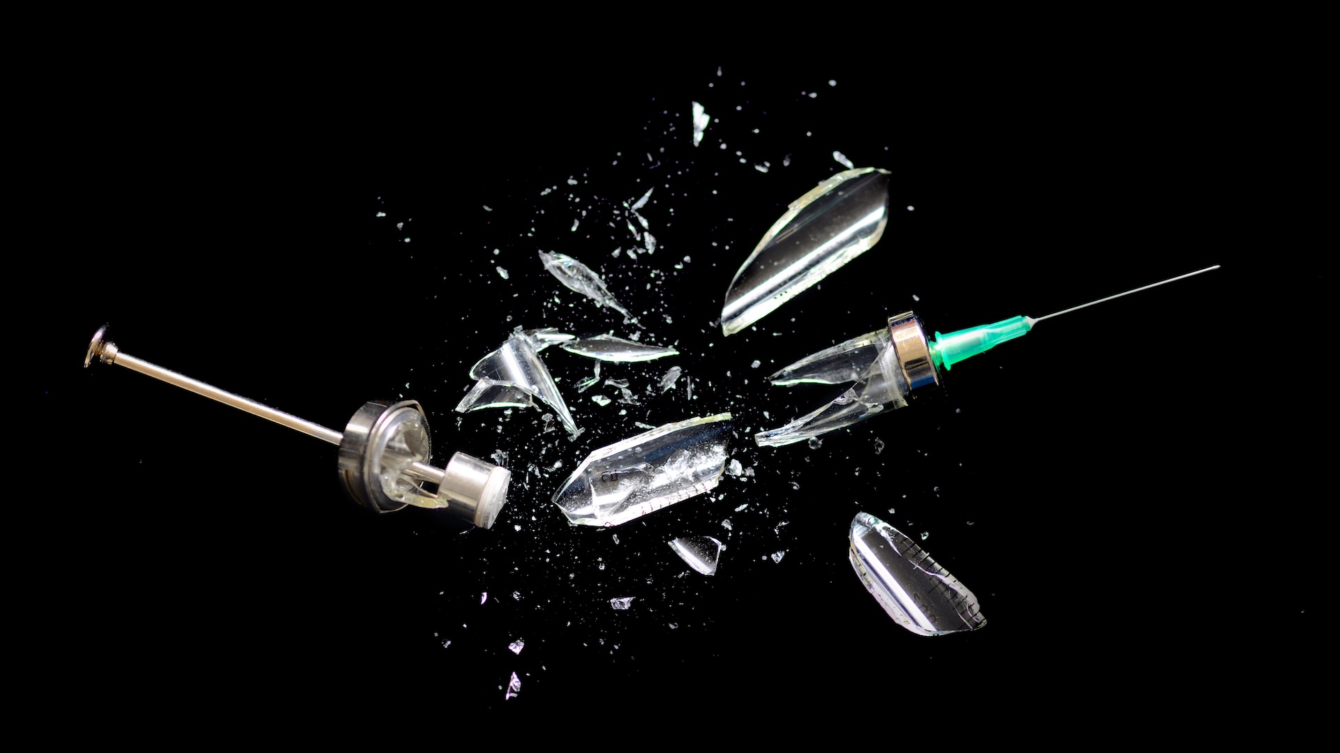 a photo of a smashed syringe