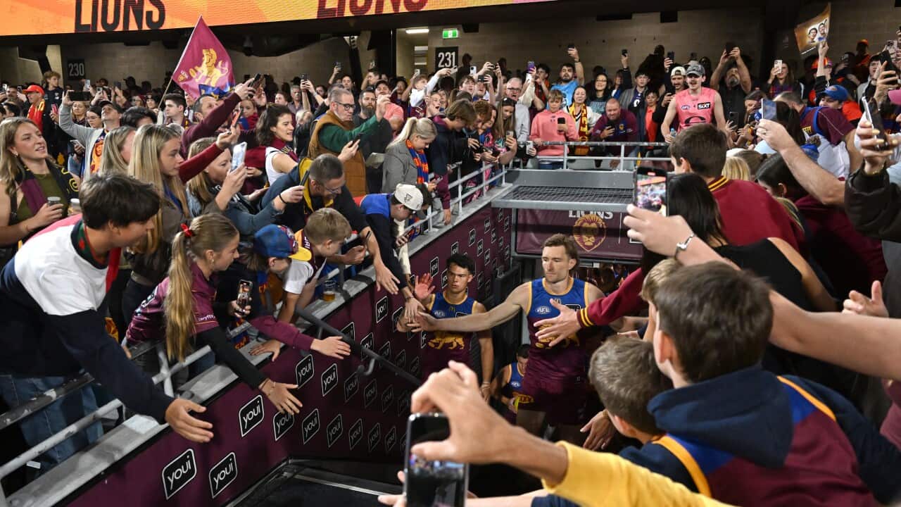 Harris Andrews of the Lions leads his team out during the AFL Semi-Final match between the Brisbane Lions and the Gold Coast Suns