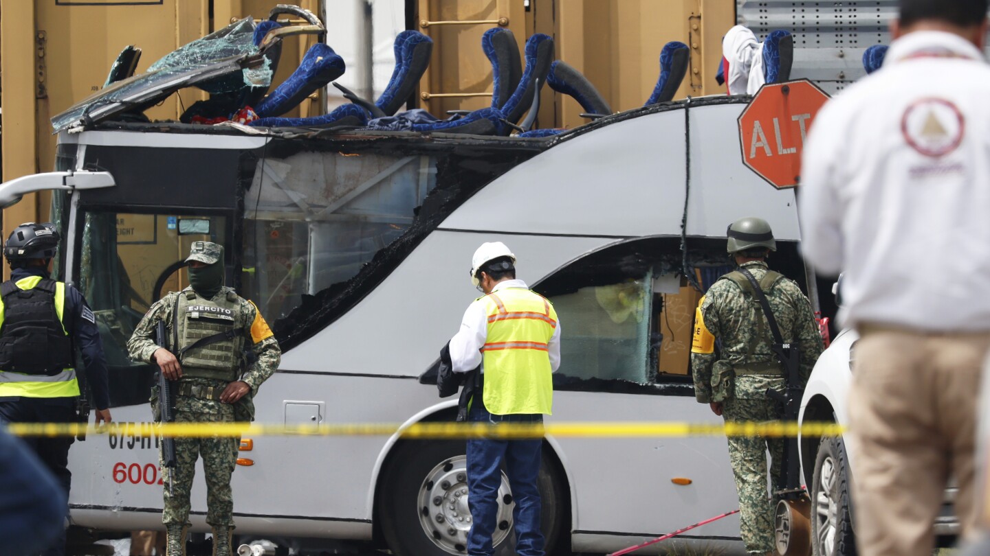 Train collision with bus in Mexico kills at least 8 people and injures dozens