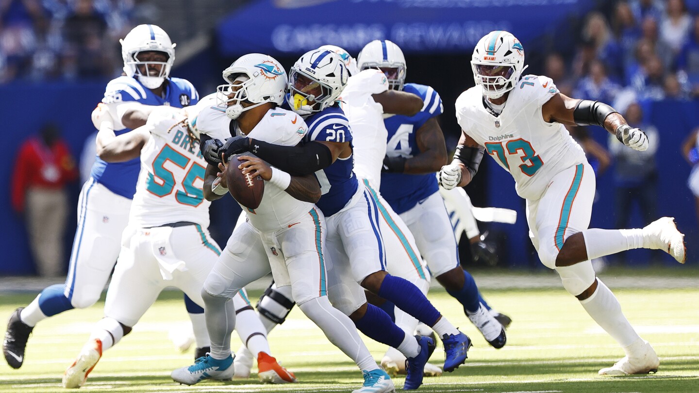 Sunday Aftermath: Dolphins' crash out, Boutte's breakout, Etienne's triumph and more