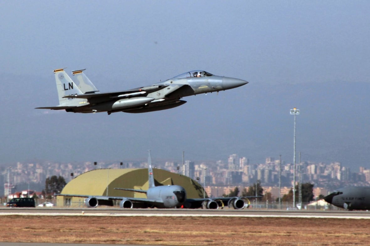 In this Dec. 15, 2015 photo, a U. S. Air Force F-15 fighter jet takes off from Incirlik Air Base near Adana, Turkey.