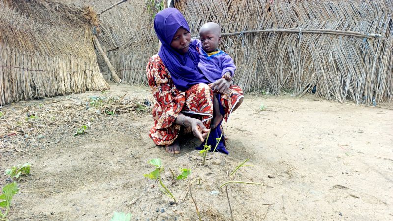 A US-funded nutrition program was helping to keep this woman’s baby alive. Days after the program was cut, he died