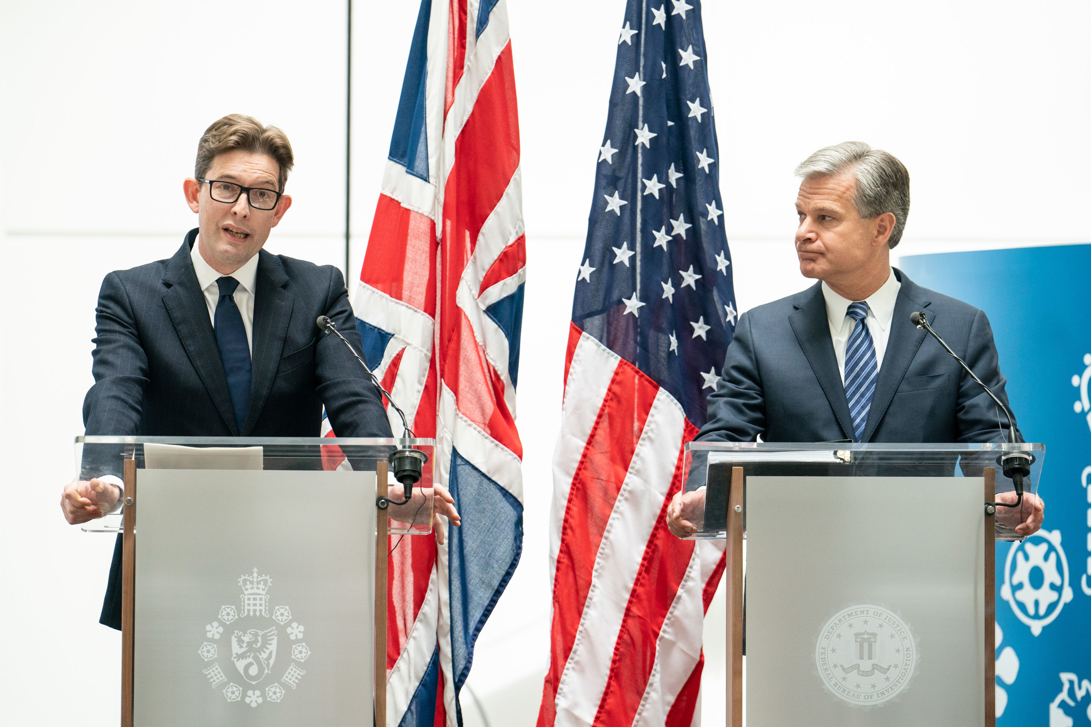 MI5 Director General Ken McCallum (left) and FBI Director Christopher Wray at a joint press conference.