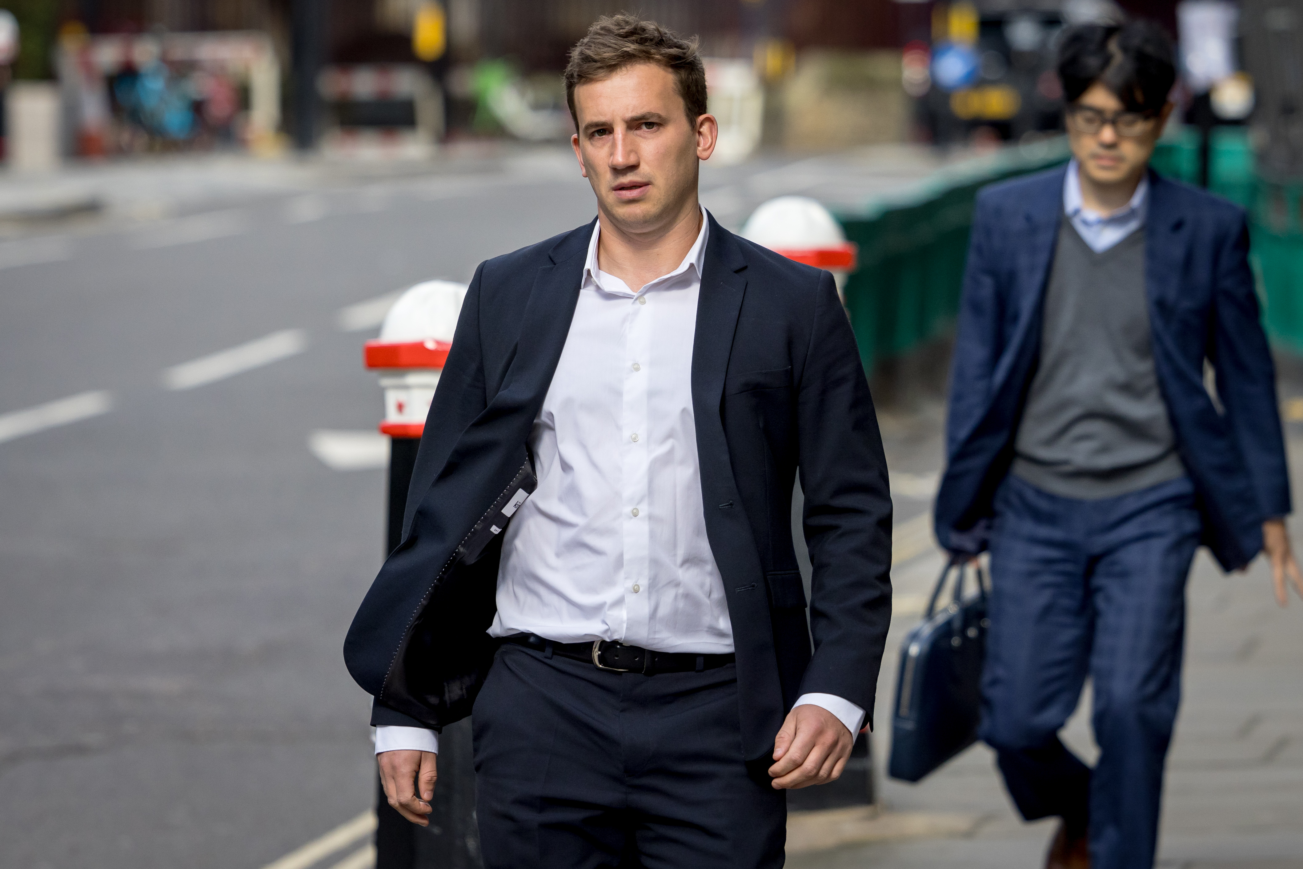 UK parliamentary researcher Christopher Cash arrives at the Old Bailey.