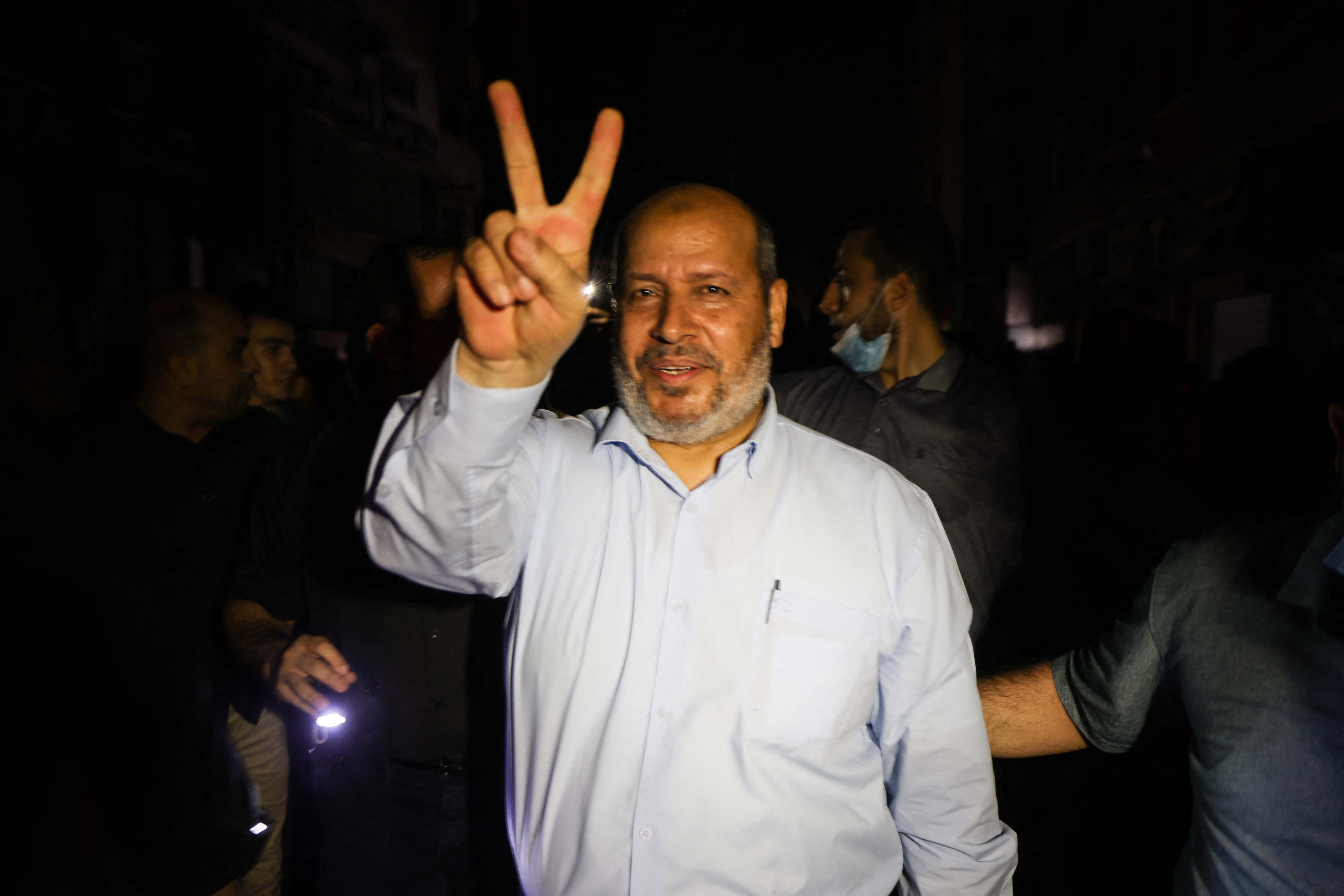Hamas leader Khalil al-Haya flashes a V-sign for victory amidst celebrations in Gaza City.