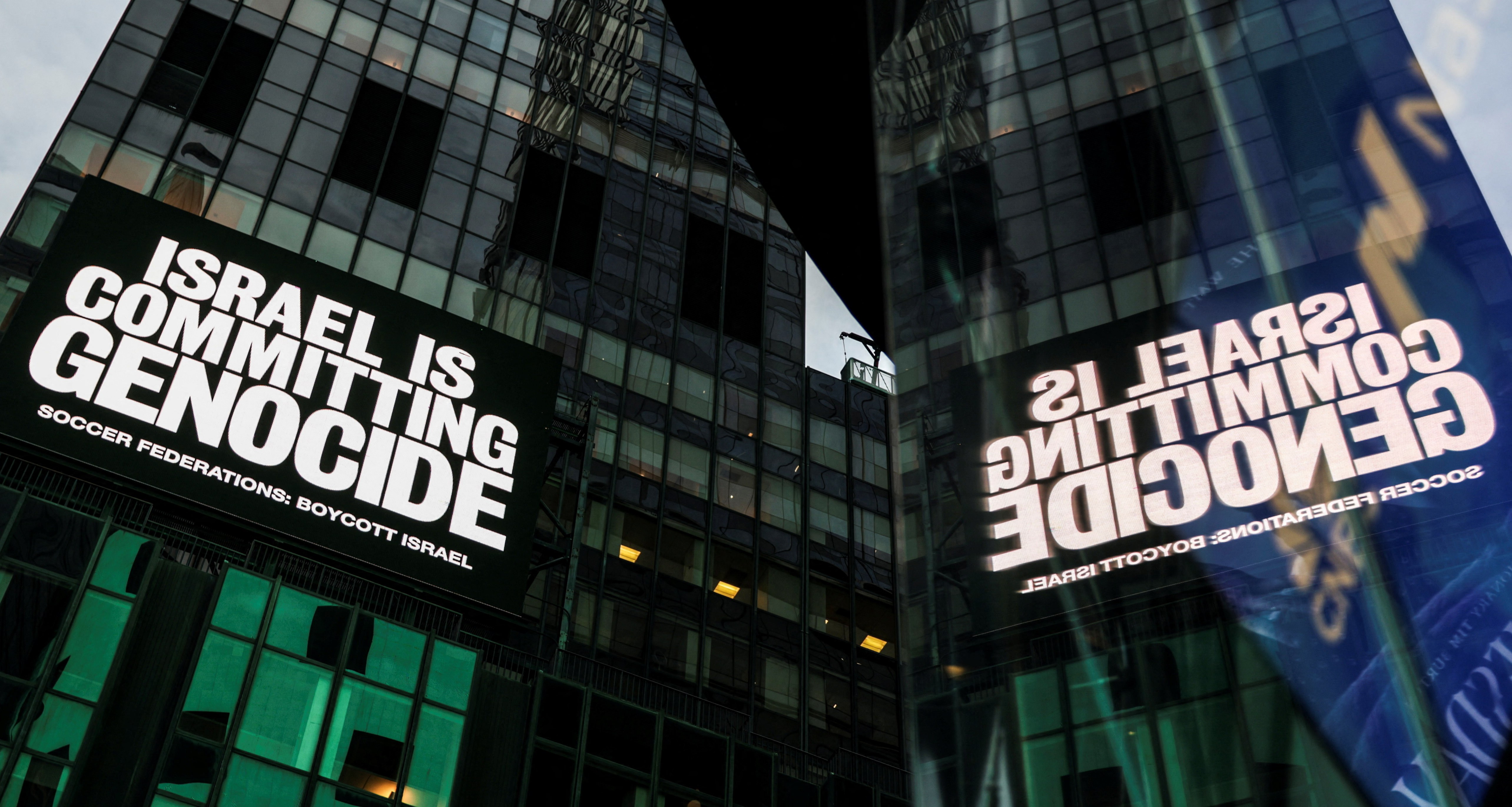 A billboard in Times Square displays the message "Israel is committing genocide" in New York City