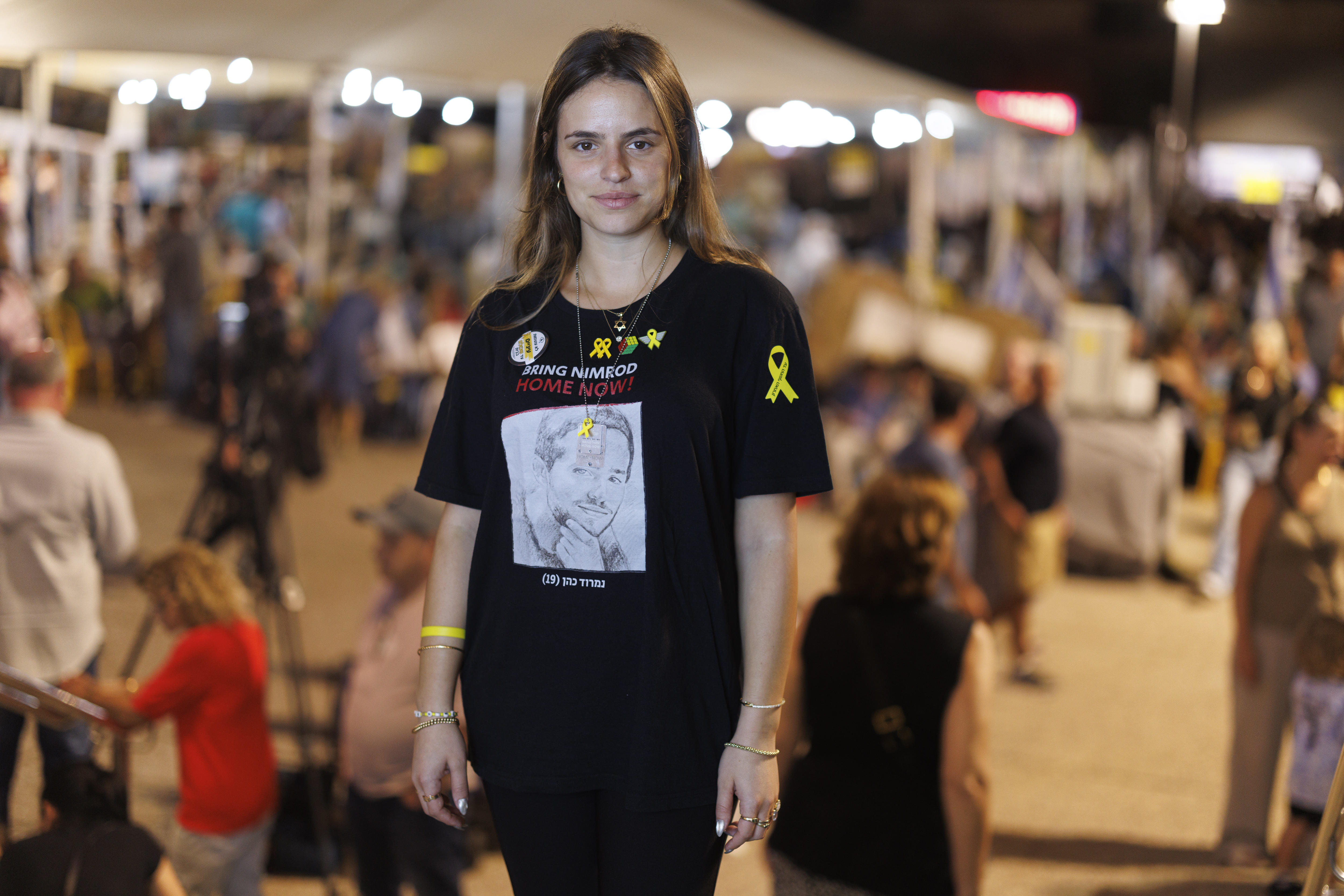 Israeli activist Gili Levy (27) in Tel Aviv, wearing a black t-shirt with "BRING NIMROD HOME NOW!" and a picture of Nimrod Cohen (19).