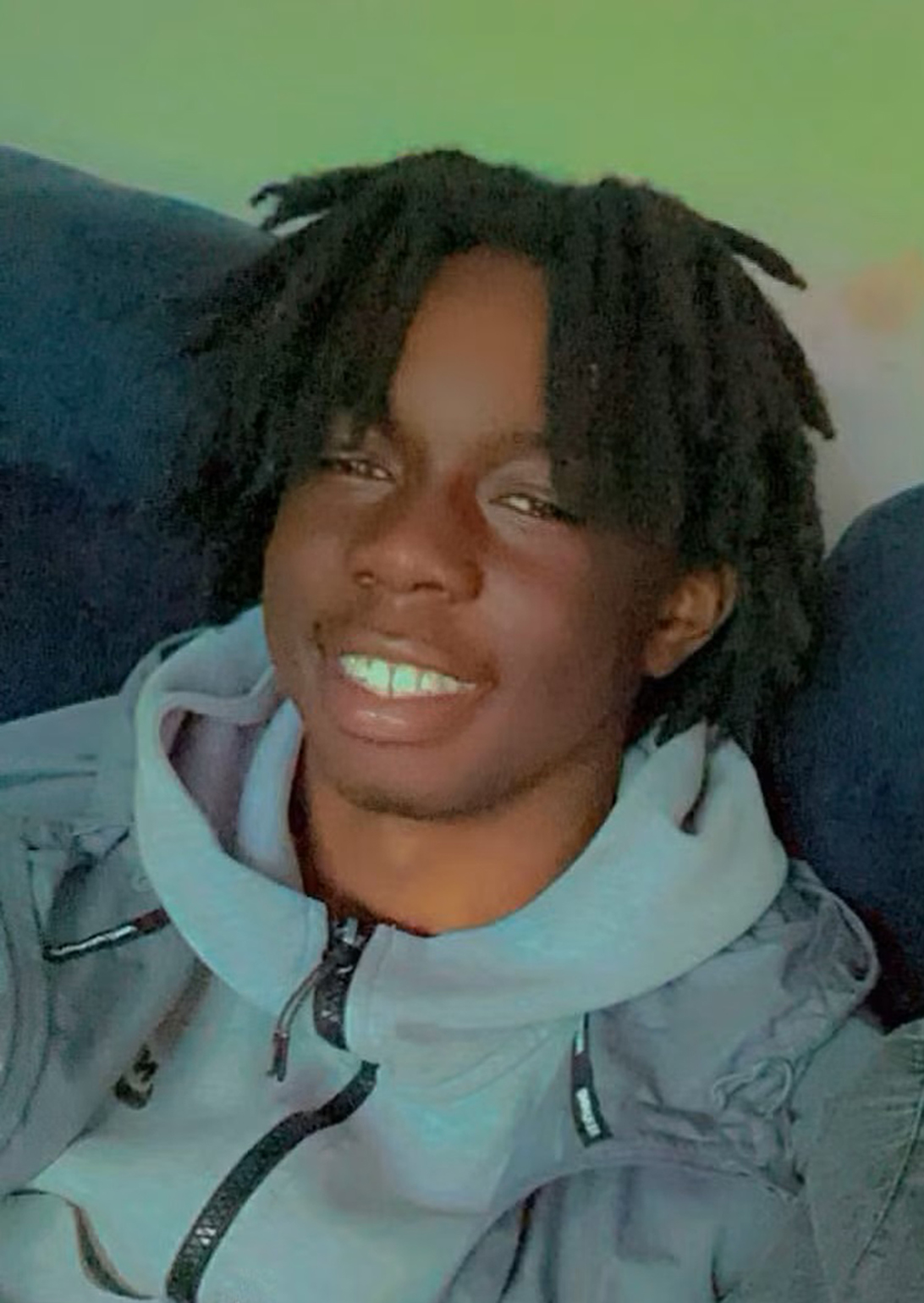 Headshot of 15-year-old Daejaun Campbell, with short dreadlocks and wearing a gray hooded jacket.